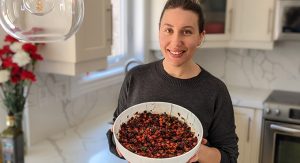 I am holding the beet with chickpeas salad I just made in a large bowl