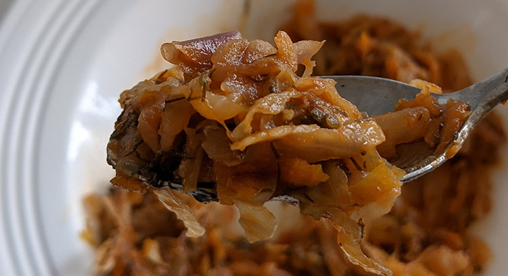 The Best Braised Cabbage Recipe, Ready on a spoon