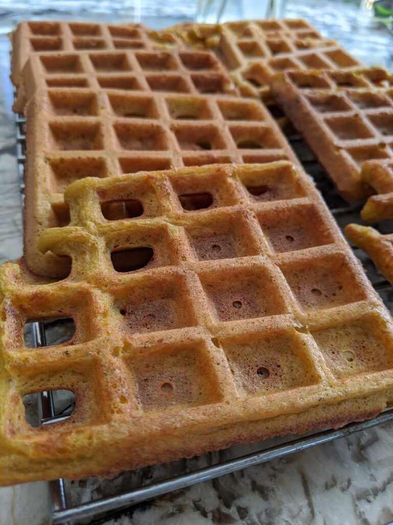 6 Gluten Free Waffles on a kitchen counter