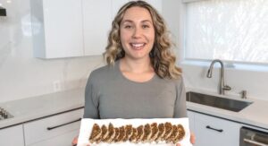 holding chocolate date dessert on a plate